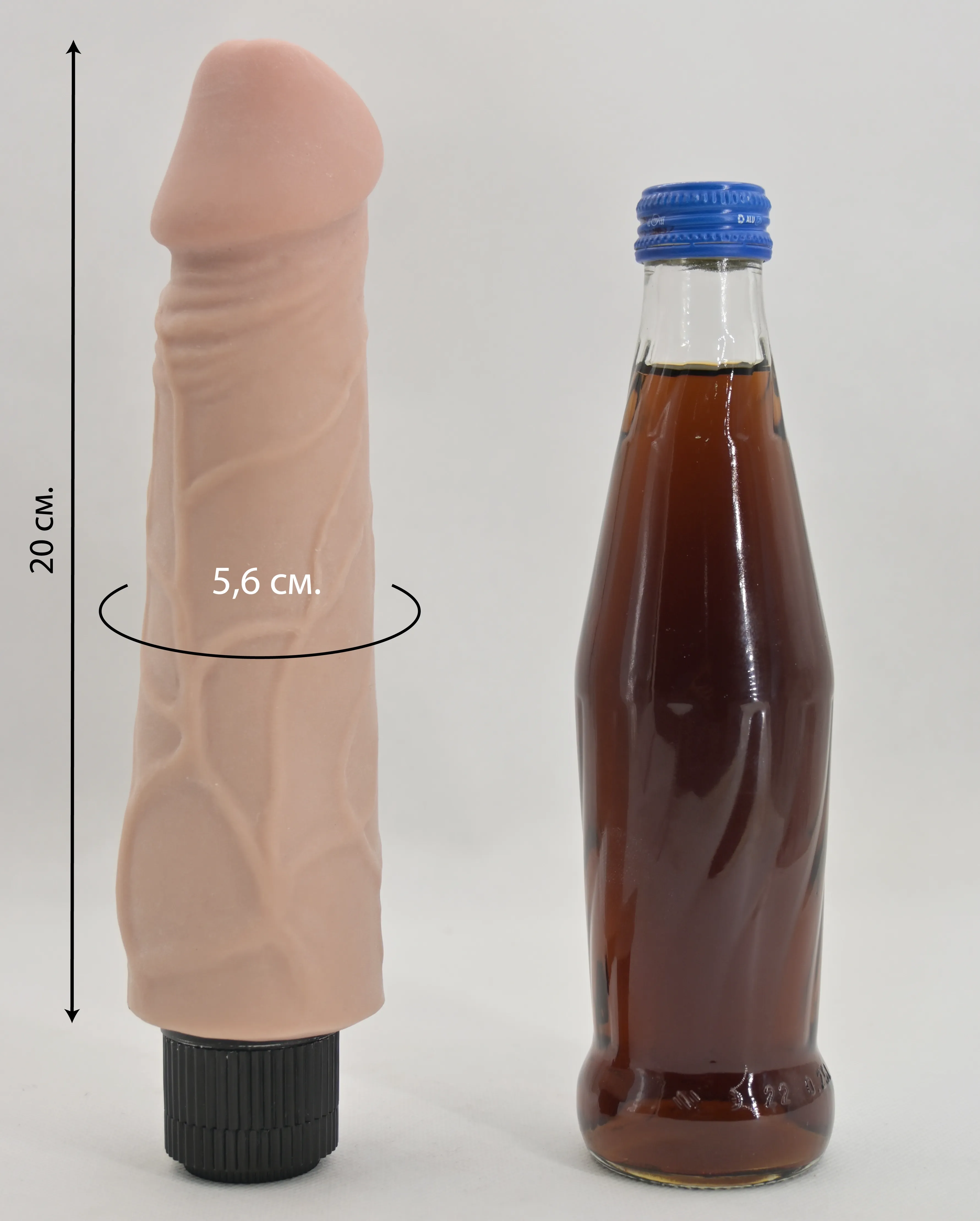 Размеры и сравнение Greedy Guy с бутылкой газировки 0,33 л.