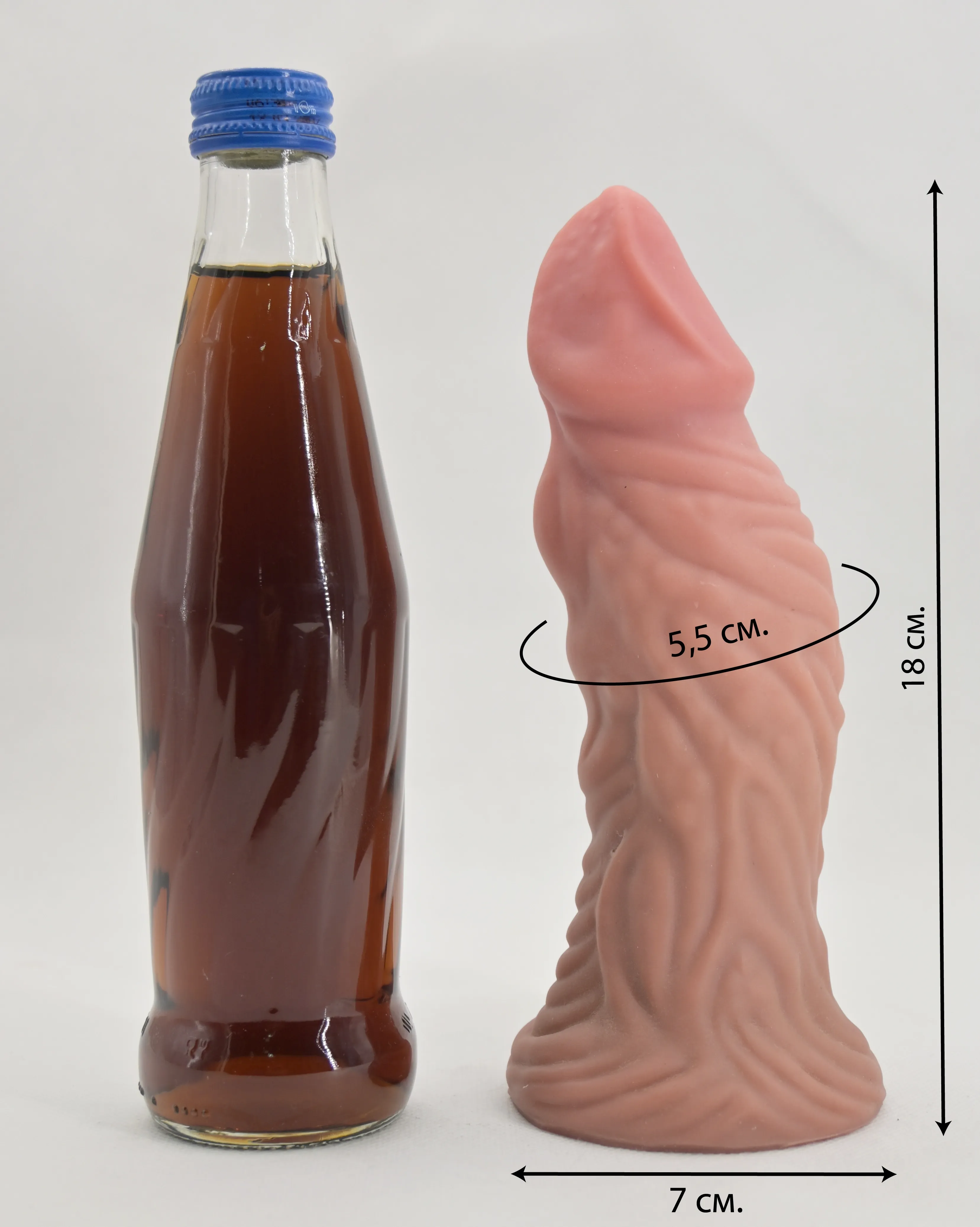 Размеры и сравнение с бутылкой газировки 0,33 л.