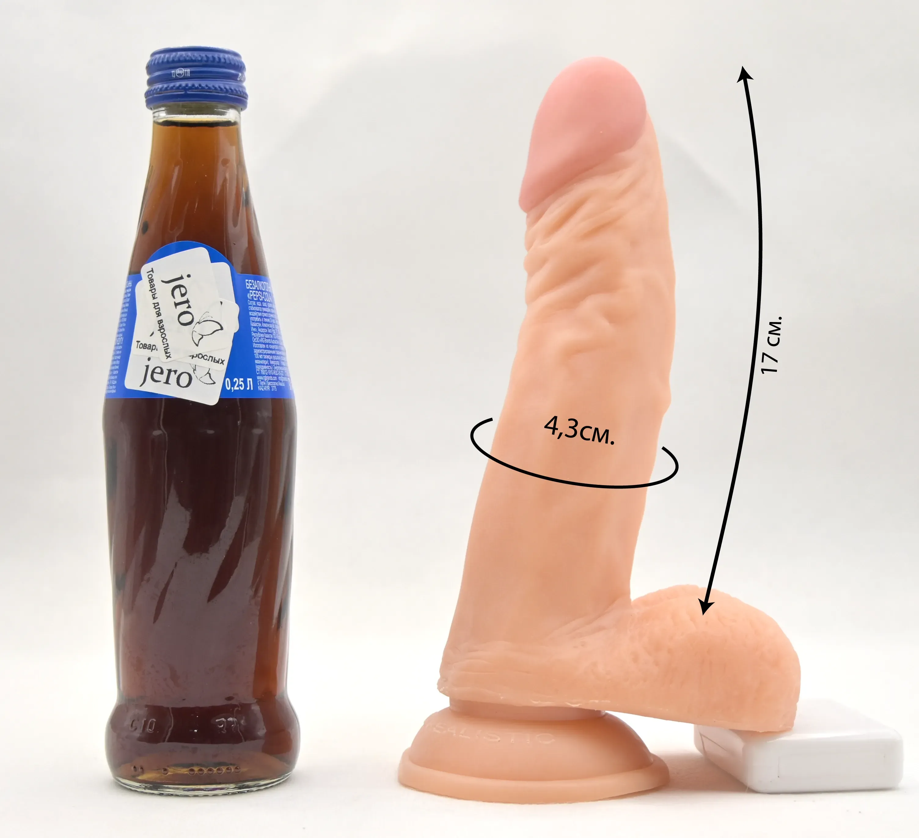 Фото с размерами и сравнение с бутылкой пепси